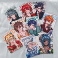 Set of anime-style character cards on a textured surface