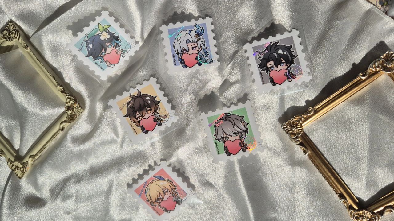 Anime character stamps on a textured fabric background with gold frames.